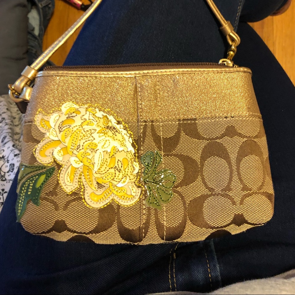 Coach Wristlet with Flower Embossing